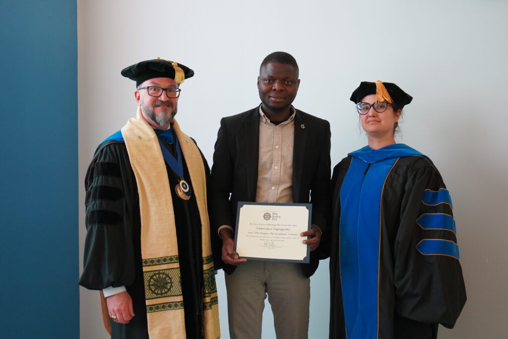 President of the MTSU Chapter of PKP Philip Phillips, (left), Lawrence Oyenpemi, (center), and Racha El Kadiri, Associate Dean of the College of Graduate Studies.